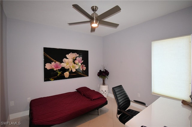 office area featuring ceiling fan and light tile patterned flooring