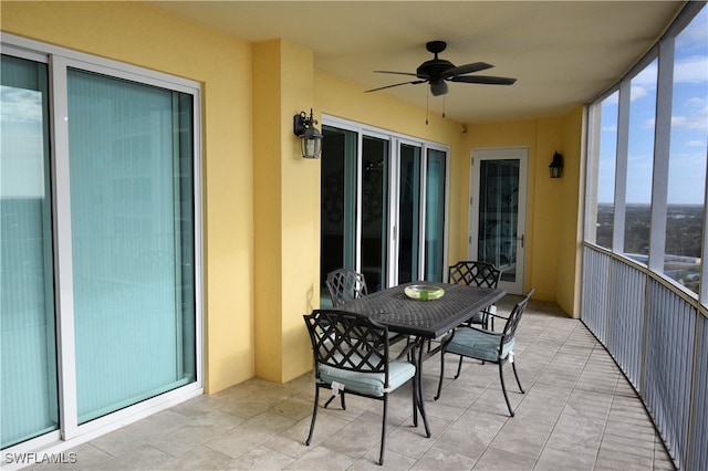 sunroom / solarium with ceiling fan