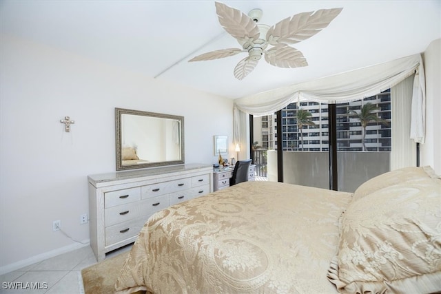 bedroom featuring light tile patterned floors, access to outside, and ceiling fan