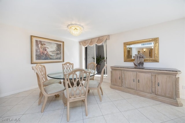 dining space with light tile patterned floors