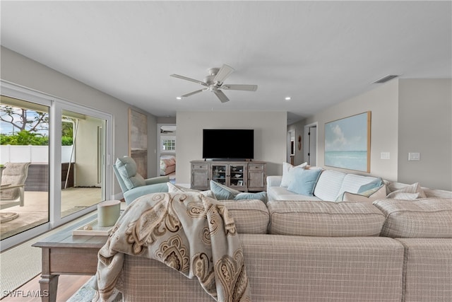 living room featuring ceiling fan