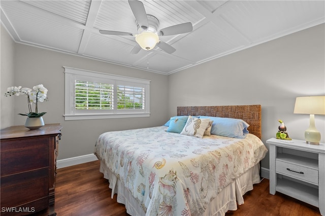 bedroom featuring dark hardwood / wood-style flooring, coffered ceiling, and ceiling fan