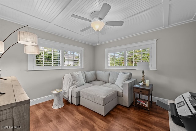 living room with dark hardwood / wood-style flooring and ceiling fan