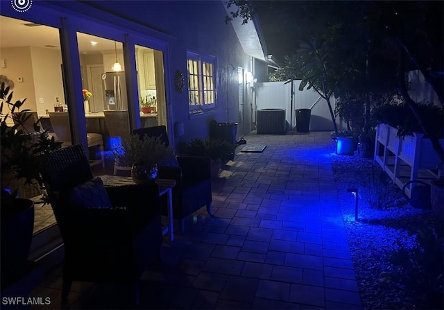 patio at twilight with cooling unit