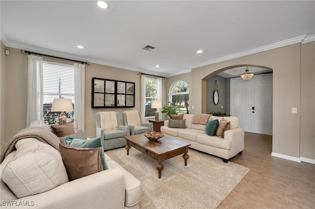 tiled living room featuring ornamental molding