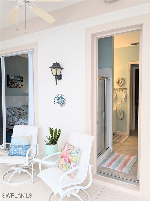 view of patio featuring ceiling fan