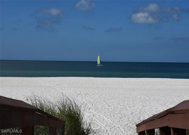 property view of water featuring a view of the beach