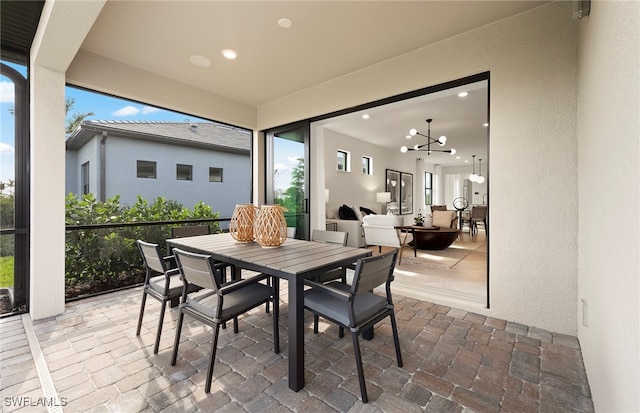 view of patio featuring ceiling fan