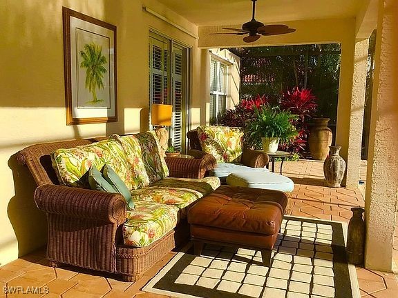 sunroom with ceiling fan