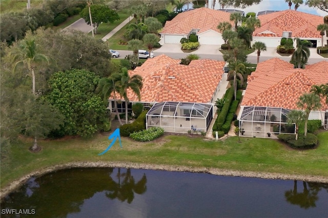 bird's eye view with a water view