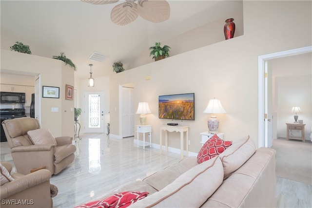 living room featuring high vaulted ceiling and ceiling fan