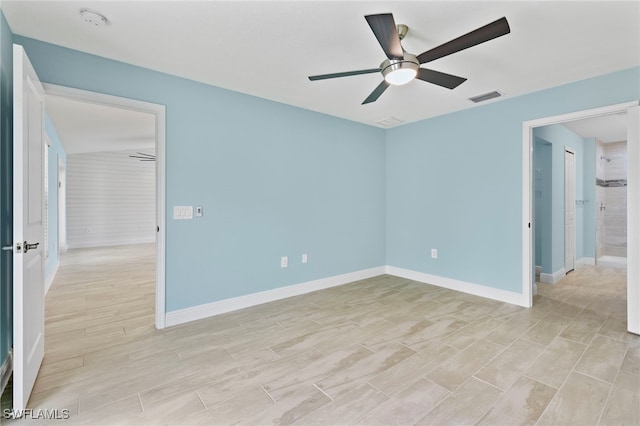 unfurnished room with ceiling fan and light hardwood / wood-style floors