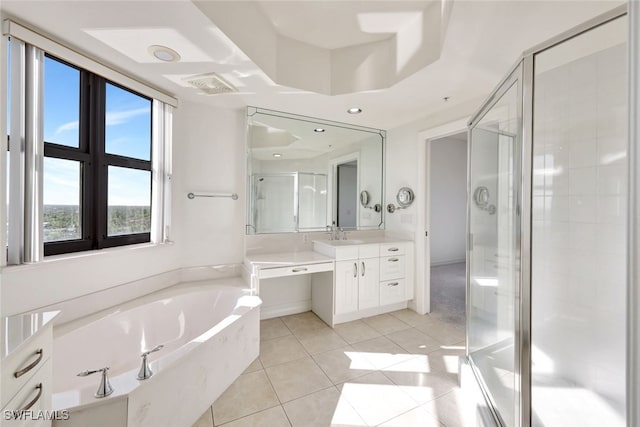 bathroom featuring vanity, tile patterned floors, and separate shower and tub