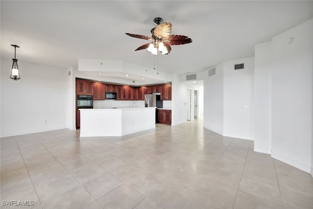 kitchen featuring black appliances, a kitchen island, light tile patterned floors, hanging light fixtures, and ceiling fan