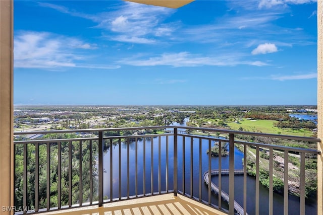 balcony featuring a water view