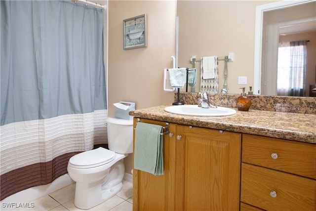 bathroom featuring vanity, toilet, tile patterned floors, and curtained shower