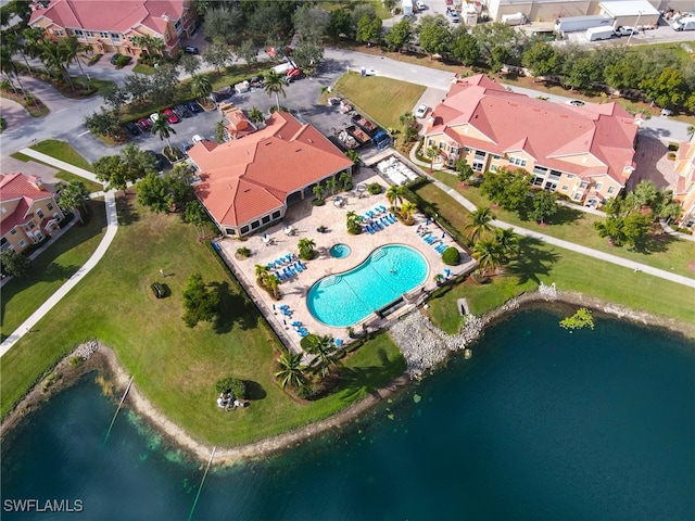 birds eye view of property featuring a water view