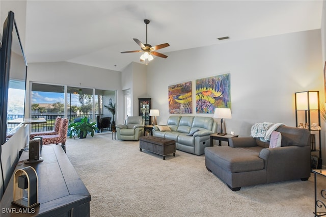 living room featuring carpet flooring, ceiling fan, and high vaulted ceiling