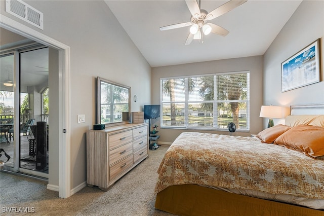 carpeted bedroom with access to exterior, ceiling fan, and lofted ceiling