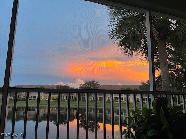 balcony at dusk with a water view