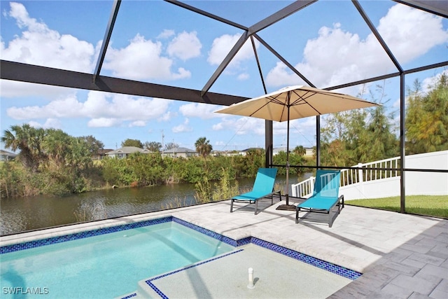 view of swimming pool with a lanai, a water view, and a patio