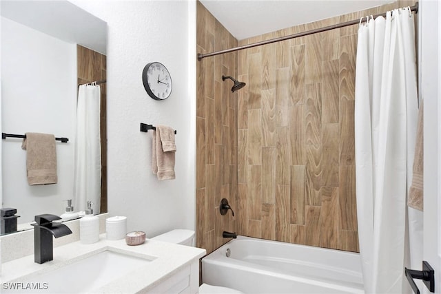 full bathroom featuring vanity, toilet, and shower / bath combo with shower curtain