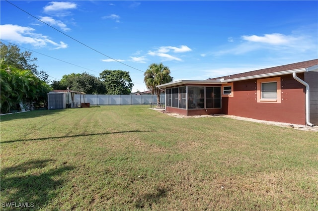 view of yard with a sunroom