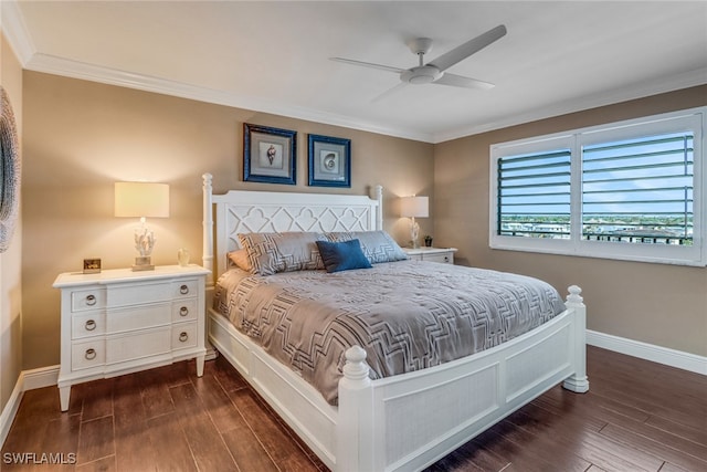 bedroom with ornamental molding, dark wood-type flooring, and ceiling fan