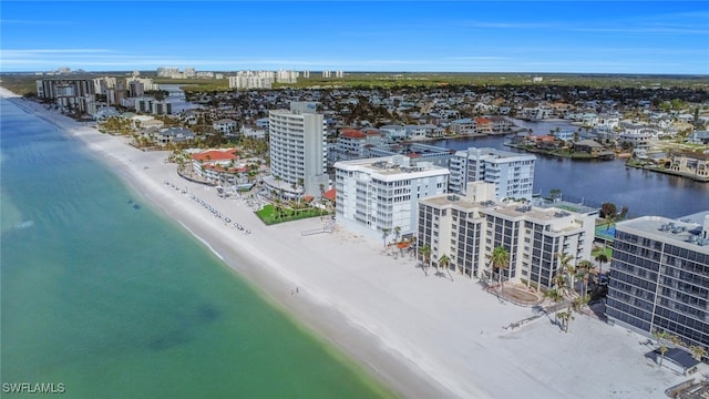 drone / aerial view with a view of the beach and a water view