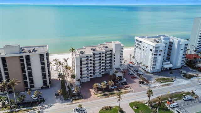 aerial view with a beach view and a water view