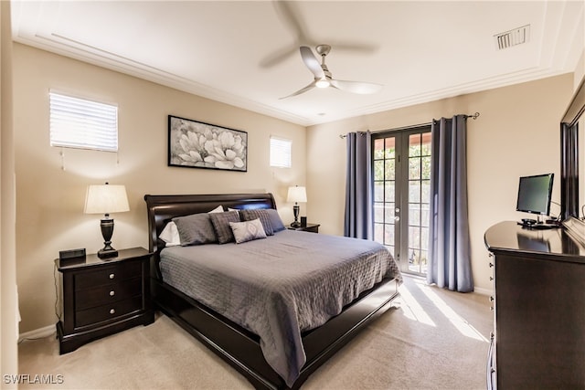 carpeted bedroom featuring ceiling fan and french doors