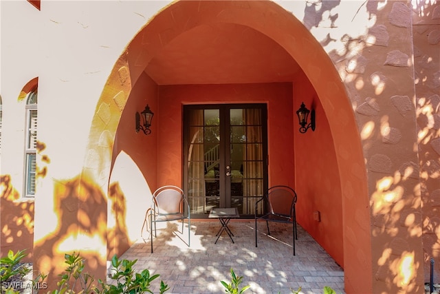 doorway to property with french doors and a patio area