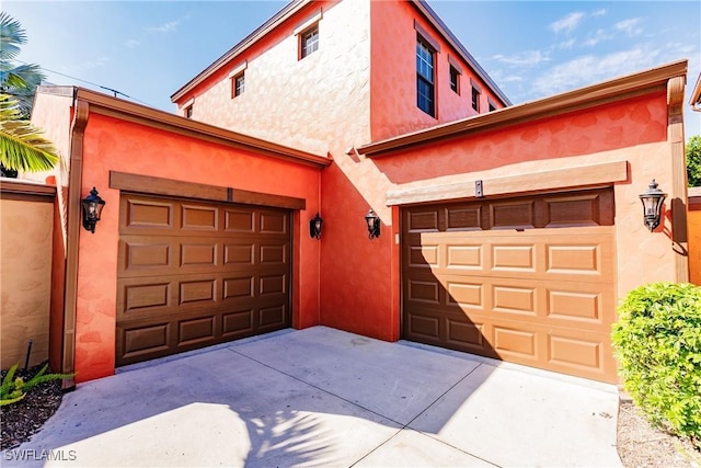 9028 Alturas St Unit 3204, Naples, FL 34113 - garage featuring driveway