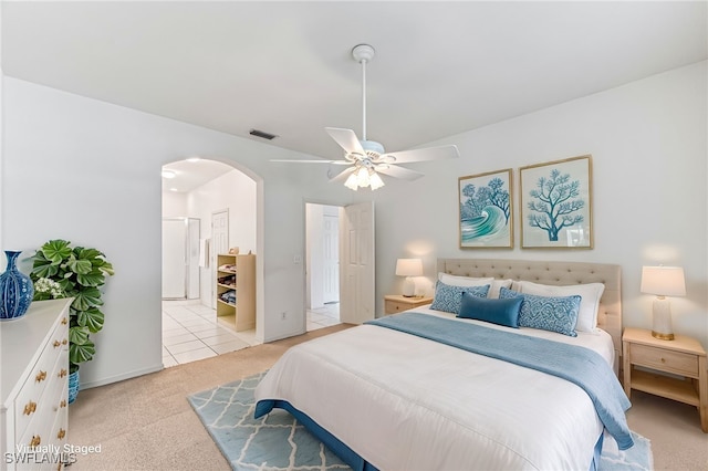 bedroom featuring ceiling fan and light colored carpet