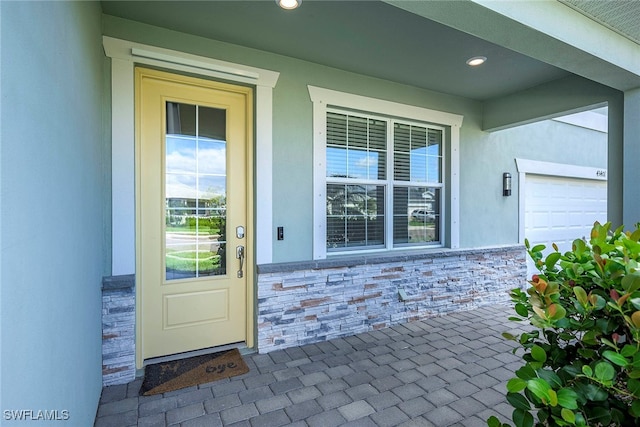 entrance to property with a garage