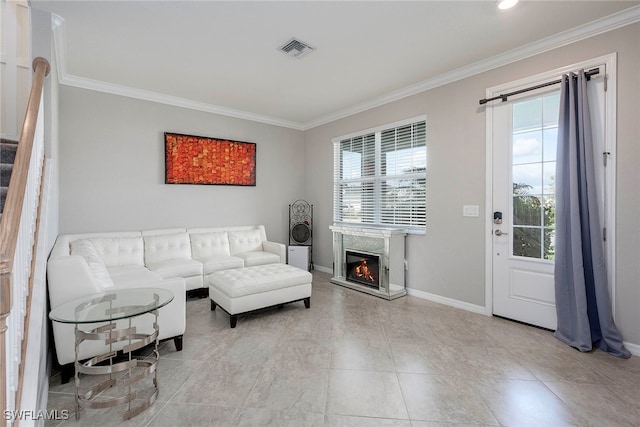 living room with ornamental molding