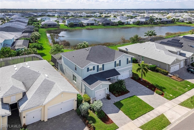 bird's eye view with a water view