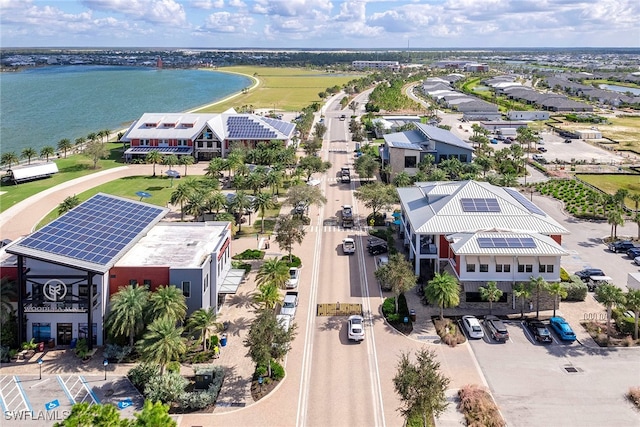 drone / aerial view with a water view