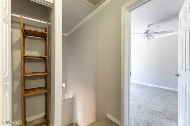 bathroom featuring ceiling fan and ornamental molding