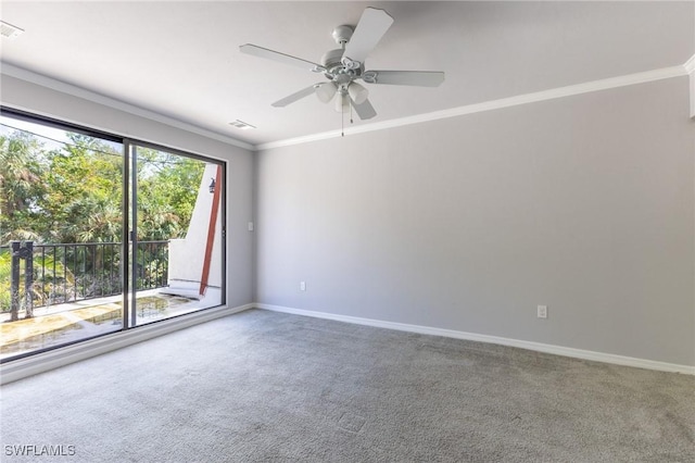 unfurnished room featuring ceiling fan, carpet floors, and ornamental molding