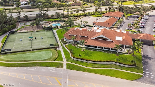 birds eye view of property with view of golf course