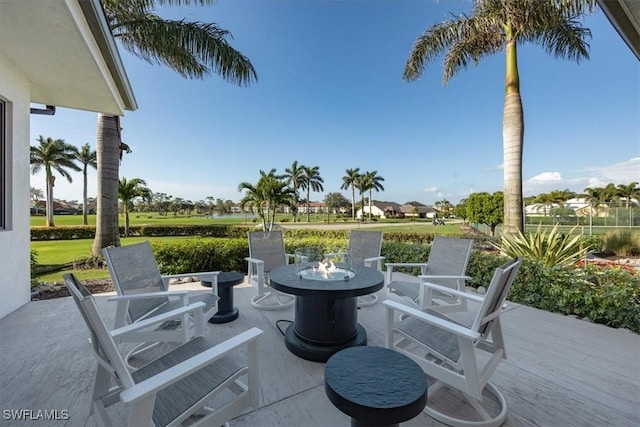 view of patio with an outdoor fire pit