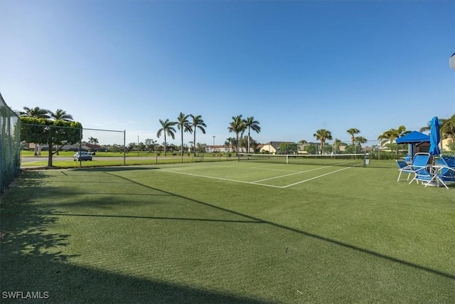 view of sport court with fence