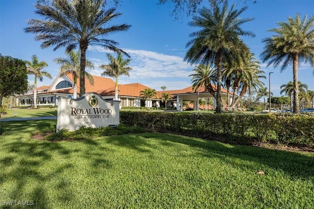 4368 Royal Wood Blvd, Naples, FL 34112 - community sign featuring a lawn