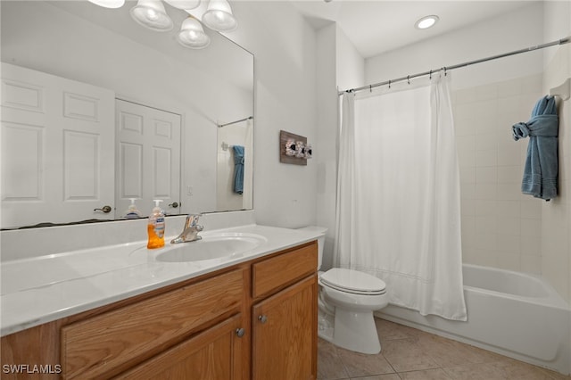 full bathroom featuring tile patterned floors, vanity, shower / tub combo, and toilet