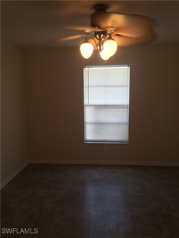 spare room featuring ceiling fan