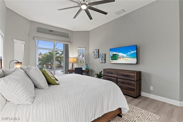 bedroom featuring ceiling fan and light hardwood / wood-style flooring