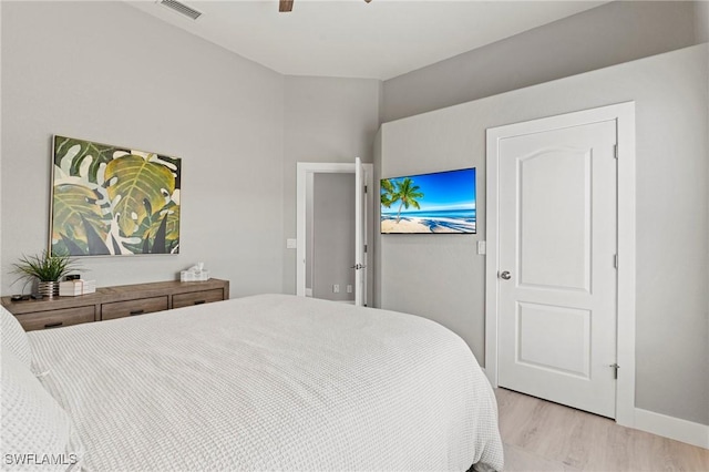 bedroom featuring ceiling fan and light wood-type flooring