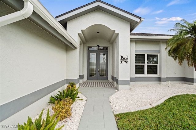 property entrance featuring french doors