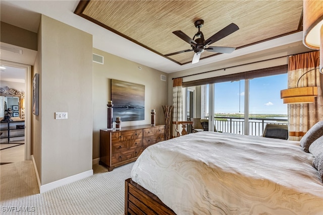 carpeted bedroom with wood ceiling, a water view, ceiling fan, and access to exterior